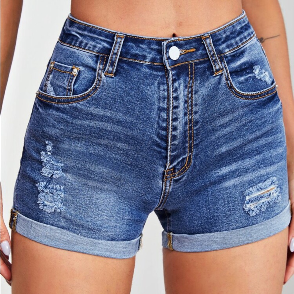 Distressed rolled denim shorts